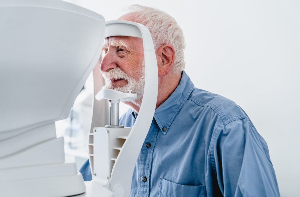 A senior getting a regular eye exam to check on his glaucoma