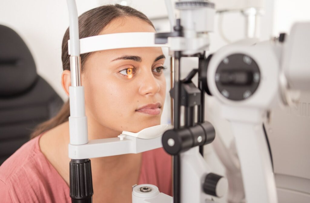 Close-up of a woman undergoing a slit-lamp exam