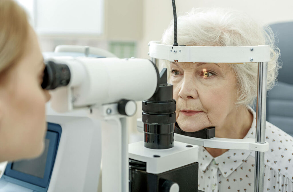 Close-up of a senior woman undergoing a slit-lamp exam.