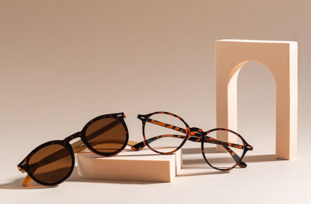 A pair of glasses sitting on a block to showcase trendy glasses of 2026